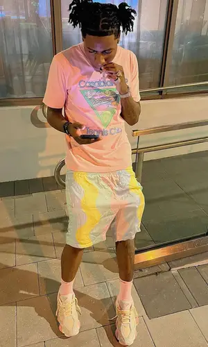 Guapo wearing Supreme sock