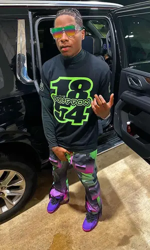 Guapo wearing Louis Vuitton eyewear