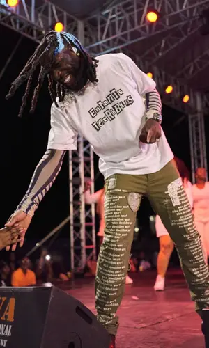 Burna Boy wearing Jean Paul Gaultier top