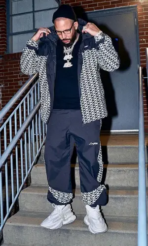 DJ Drama wearing Louis Vuitton hoody
