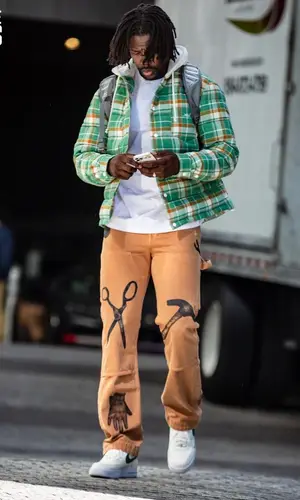Jrue Holiday wearing Amiri pants