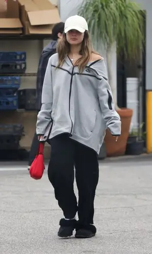 Addison Rae’s Outfit in Nike Shorts, Ugg Boots & Prada Bag (2023)