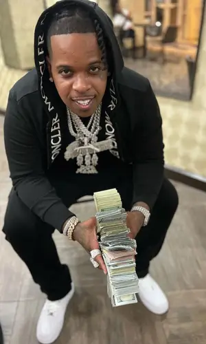 Finesse2tymes wearing Moncler hoody