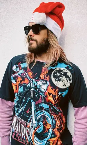 Jared Leto wearing Thirty Seconds to Mars Merch t-shirt