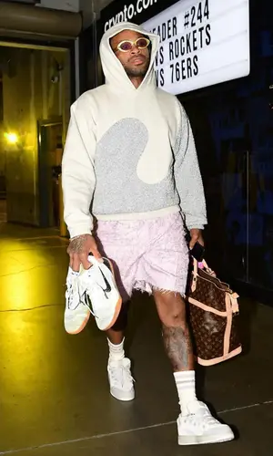 PJ Tucker’s Outfit in Louis Vuitton Bag, Dior Eyewear & ERL (2023)