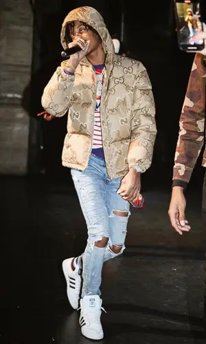 Skilla Baby wearing Gucci jacket