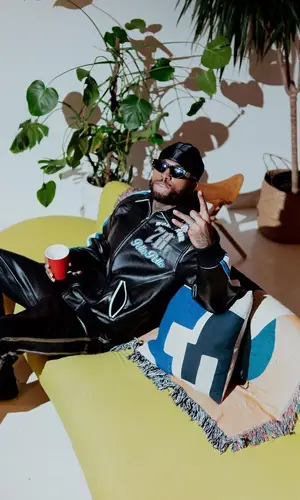 Dave East wearing Balenciaga eyewear