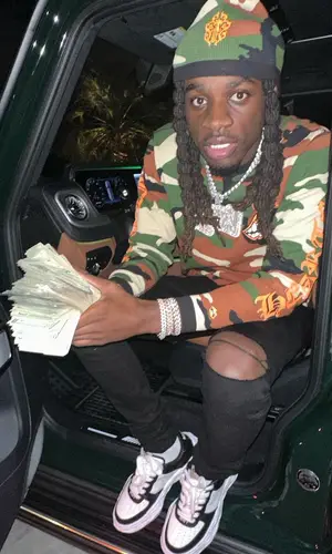 SleazyWorld Go wearing Chrome Hearts hat