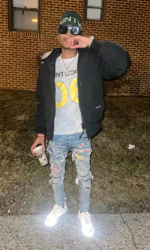 Chow Lee wearing Canada Goose jacket