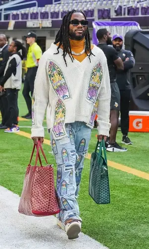 Jaylon Smith wearing Who Decides War jacket