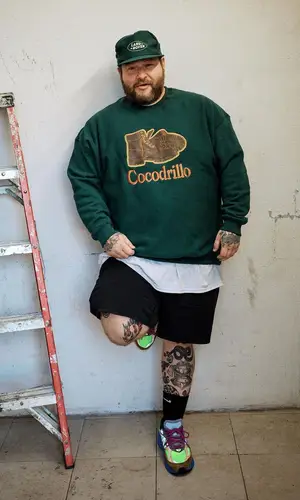 Action Bronson wearing Baklava Flea Market sweater