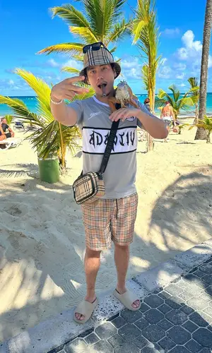 J2Lasteu wearing Burberry swimwear