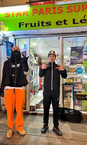 J2Lasteu wearing Nike sneakers