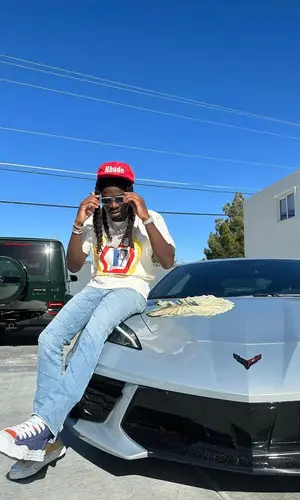 SleazyWorld Go wearing Rhude t-shirt