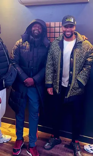 Rohff wearing No Name cap