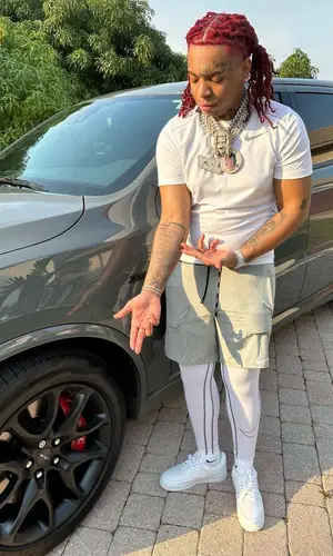 Lil Gotit wearing Nike pants