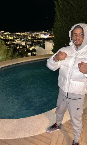 BandoKay wearing Nike hoody