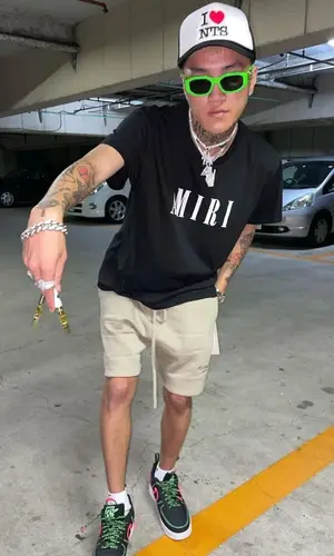 Lex wearing Versace eyewear