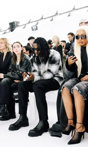 Polo G wearing Givenchy trousers