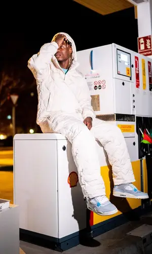 Eduardo Camavinga’s Outfit in Arte Antwerp Jacket & Shoe Surgeon Sneakers (2023)