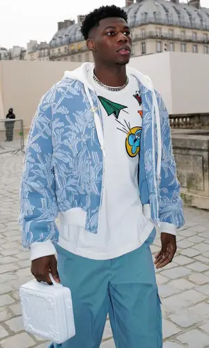 Aurelien Tchouameni wearing Louis Vuitton jacket