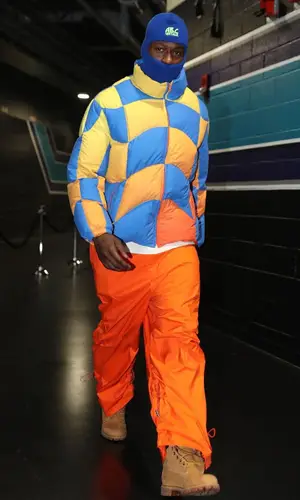 Terry Rozier wearing Moncler pants