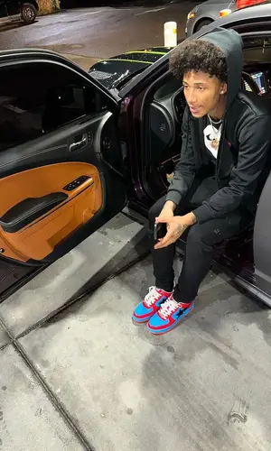 Mikey wearing Bape sneakers