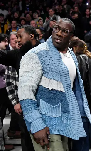 Shannon Sharpe wearing Nike sneakers