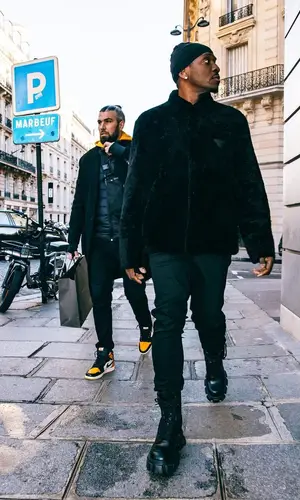 Pusha T wearing Prada boots