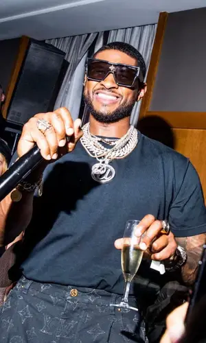 Usher wearing Louis Vuitton eyewear