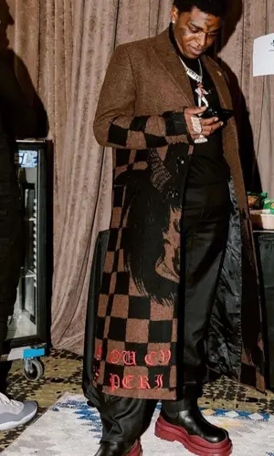 Kodak Black wearing Bottega Veneta boots