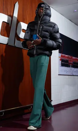 Bol Bol wearing Goyard bag