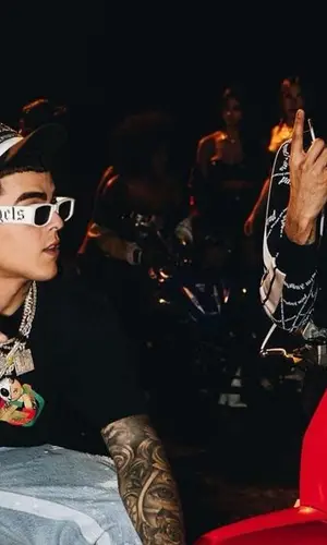 Yovngchimi wearing Palm Angels t-shirt