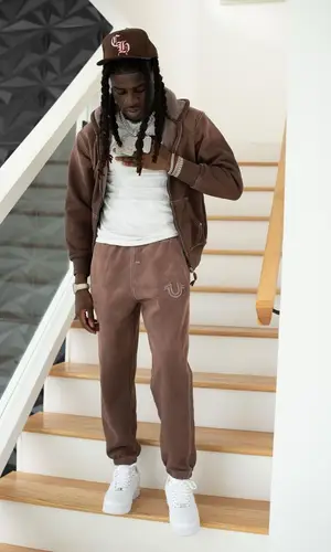 SleazyWorld Go’s Outfit in Supreme Hoodie, Chrome Hearts Cap & True Religion (2023)