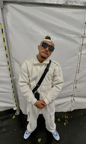 Bru-C wearing Louis Vuitton pants