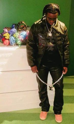 Lil Dann’s Outfit in Sole et. Al Jacket, Jordan Sneakers & Louis Vuitton Bag (2023)