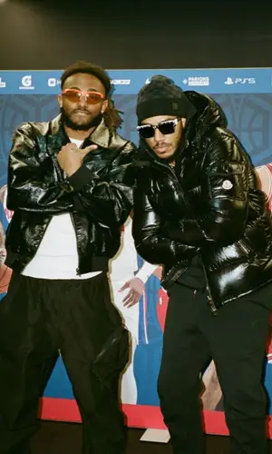 AJ Tracey’s Outfit in Moncler Jacket, Nike Pants & Louis Vuitton Hat (2023)