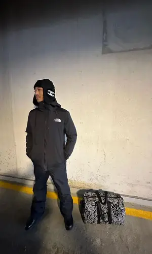 Lil Meech wearing The North Face jacket