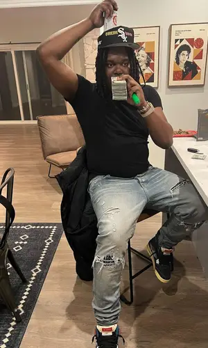 Lucki wearing Amiri jeans