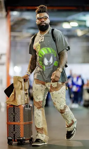 Ezekiel Elliott wearing Gallery Dept. pants