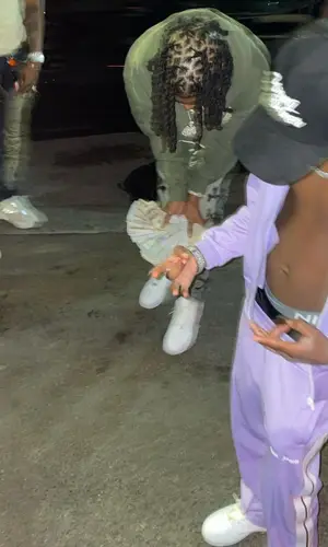 Lil 50 wearing Palm Angels jacket