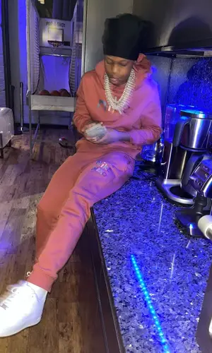 Lil 50 wearing Nike pants