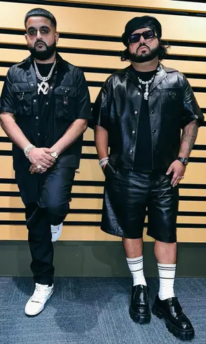 Cash’s Outfit in Prada Boots (2022)