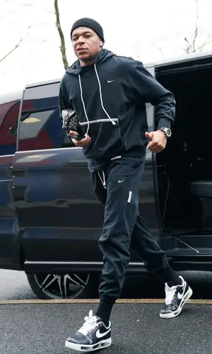 Kylian Mbappe wearing Nike pants
