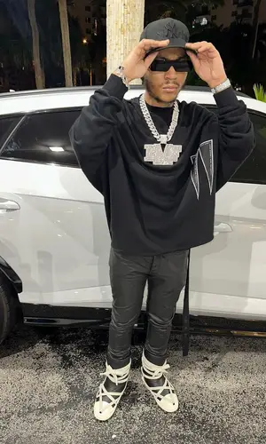 Lil Meech wearing Rick Owens eyewear