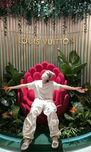 J-Hope wearing Nike sneakers