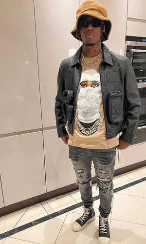 Wilfried Zaha wearing Rick Owens sneakers