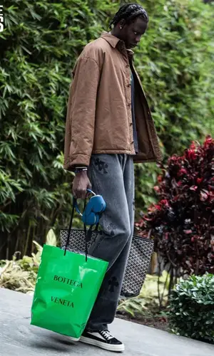 Bol Bol wearing Goyard bag