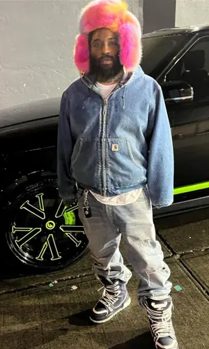 ASAP Bari’s Outfit in Carhartt Jacket, Celine Jeans & Louis Vuitton Hat (2023)