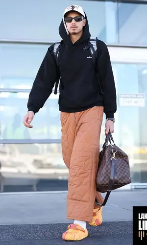 Juan Toscano-Anderson’s Outfit in Madhappy Hoodie, Louis Vuitton Bag & Dior Eyewear (2023)